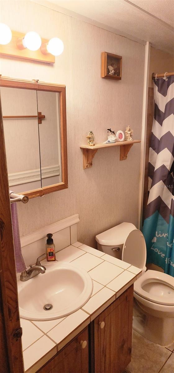 121 PINE TREE DR — photo 11