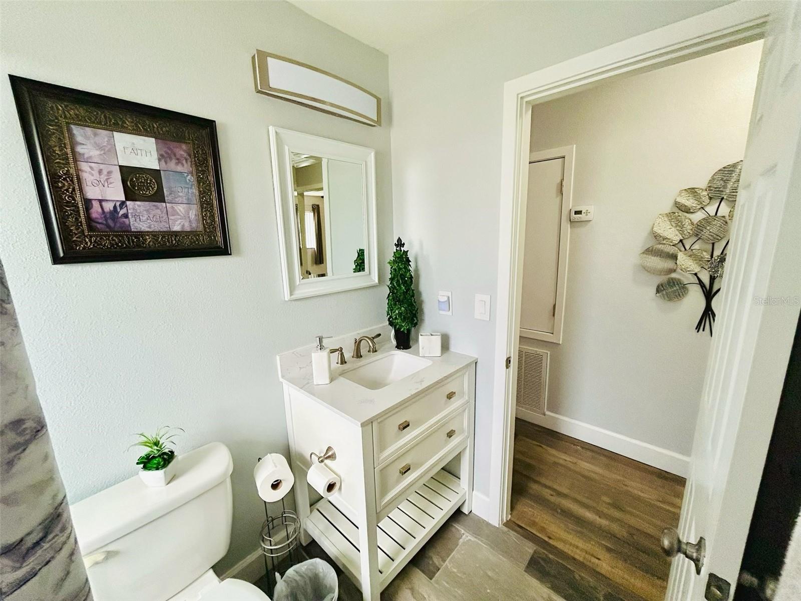 1643 SAXON BLVD — photo 8