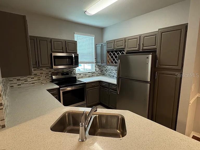 3420 GREENWICH VILLAGE BLVD #104 — photo 4