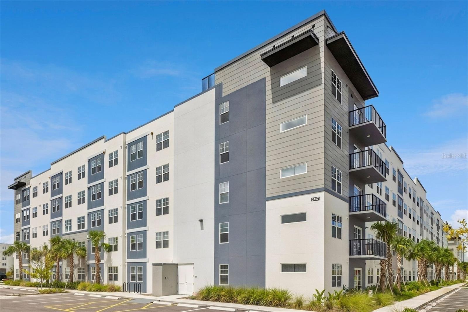 5587 MILLENIA PARK BLVD #203 — photo 2
