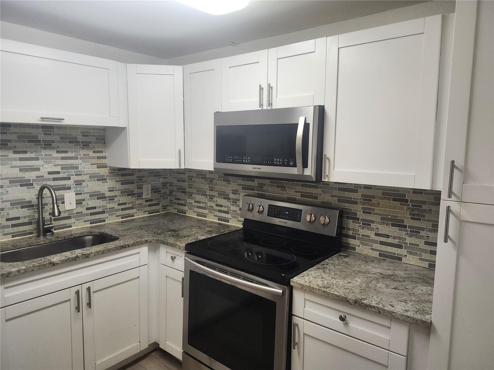 12727 N OLA AVE — photo 4