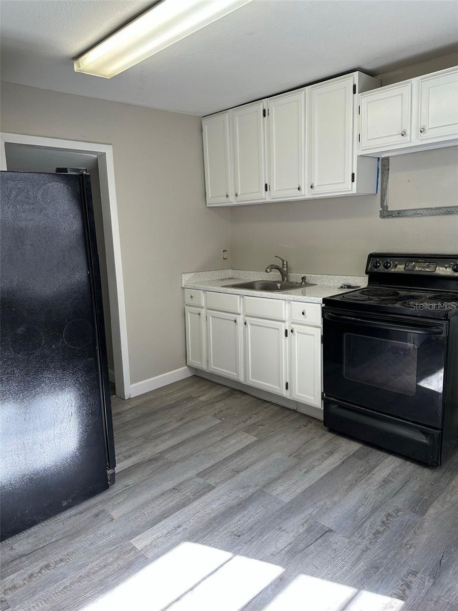 1219 W 8TH ST — photo 4